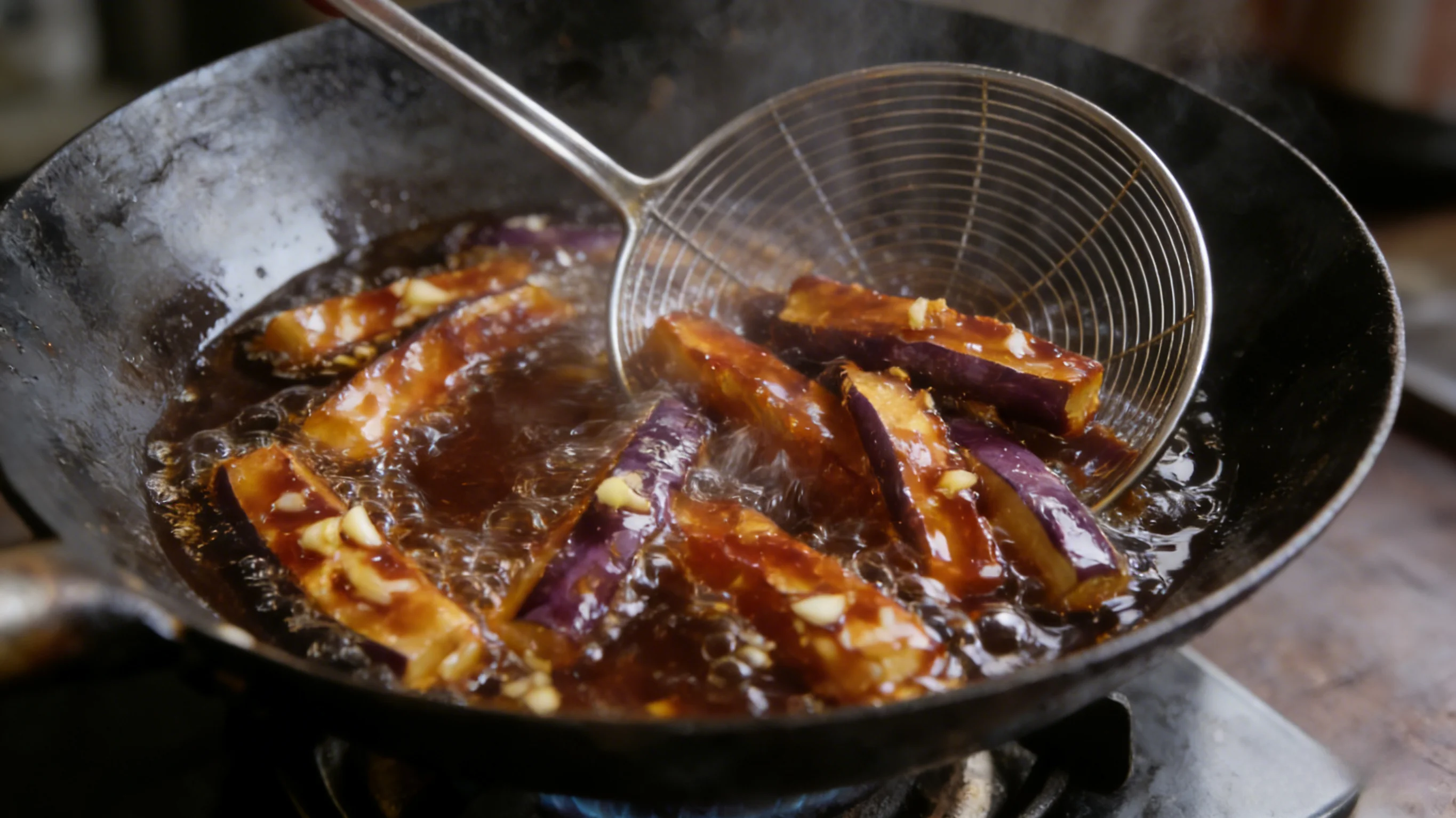 Simmering thick savory bean paste sauce in wok