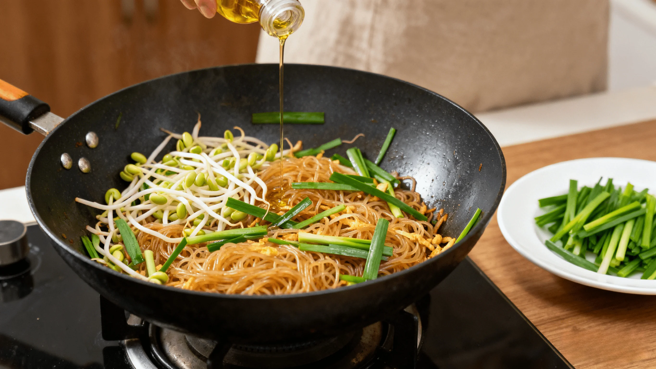 Adding Bean Sprouts and Chives